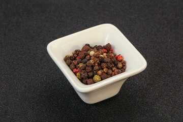 Peppercorn heap in the bowl