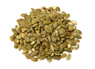 Pumpkin seeds on a white background