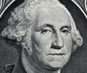 Macro photo of George Washington on the one dollar bill.