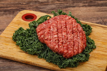 Raw beef burger cutlet for cooking
