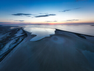 Unusual islands on a brilliant lake and colorful sunset