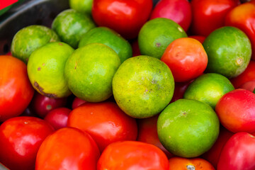 Tomatoes, vegetables, and lime fruits from Thailand