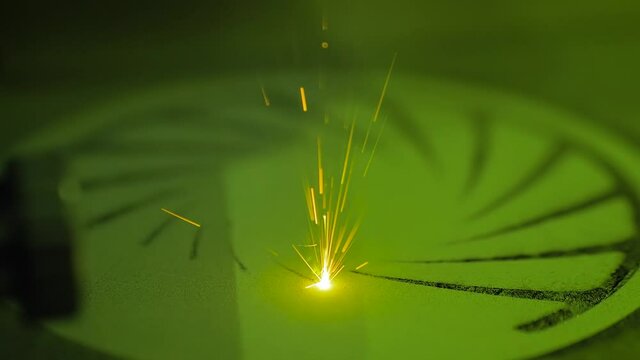 Selective laser melting - additive manufacturing metal 3D printer printing model - close up view, slow motion. Prototyping, metalworking, engraving, futuristic, production and technology concept