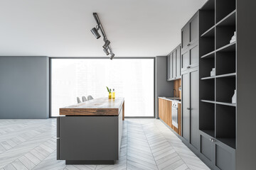 White and gray kitchen interior with island