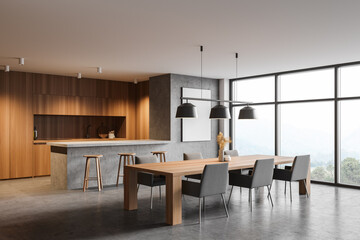 Concrete and wooden kitchen corner with poster and window