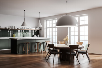White and green kitchen corner with table