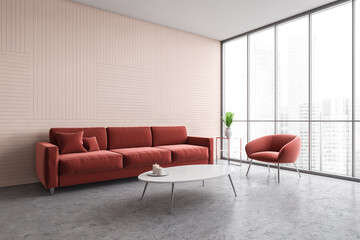 Pink living room corner with sofa and armchair