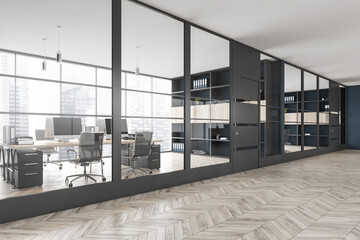 Black office room with chairs and table behind glass windows