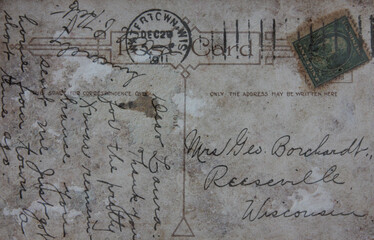 Reverse side of  old post card, circa 1915. Image in vintage grunge style