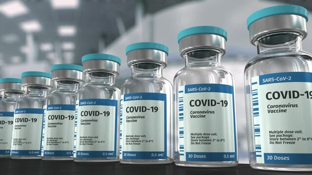 COVID-19 Coronavirus vaccine production line looped video.