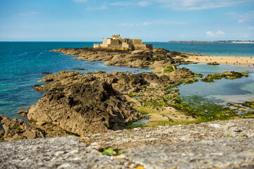 Fototapeta na wymiar Fort National on tidal island Petit Be in Saint-Malo. Saint-Malo is a walled port city in Brittany in France