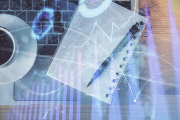 Multi exposure of forex chart drawing and work table top veiw. Concept of financial analysis.