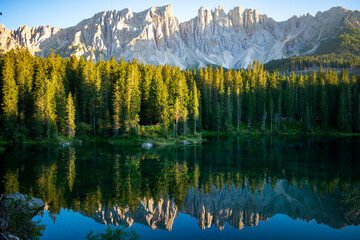 Italy, South Tyrol, Karersee - 5 September 2020 - The Karersee with the reflection of the Lagorai at sunset