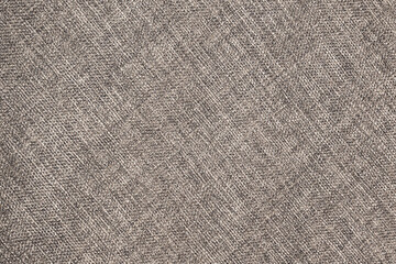 Gray fabric background. Grey canvas texture. Bright textile material background. Gray fiber pattern. Checkered textile texture.