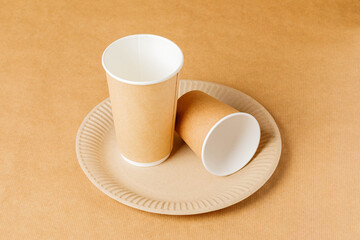 Disposable paper crockery on disposable paper tablecloth