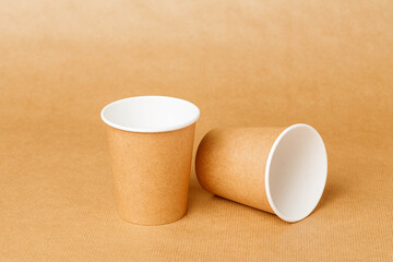 Disposable paper crockery on disposable paper tablecloth