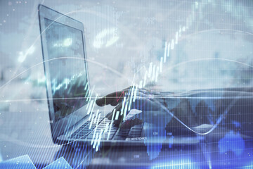 Double exposure of woman hands typing on computer and forex chart hologram drawing. Stock market invest concept.