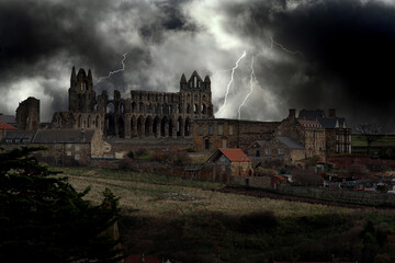 Whitby abbey in north Yorkshire. UK. Coast. Bram Stoker Dracula location. Sky added for effect. - obrazy, fototapety, plakaty