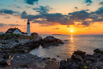 Portland Head Light at sunrise in Maine, New England, USA.	