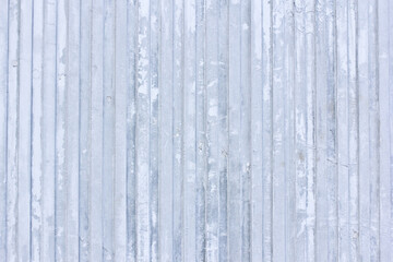 The texture of the old blue striped concrete wall. Part of the construction of a concrete object. Empty background.