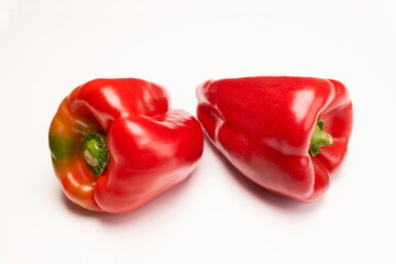 Red peppers on white background