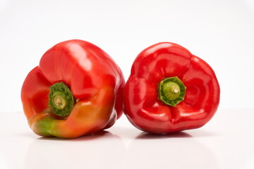 Red peppers on white background