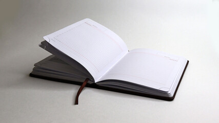 diary in open form on a white background