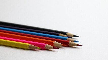 colored pencils on a white background are beautiful