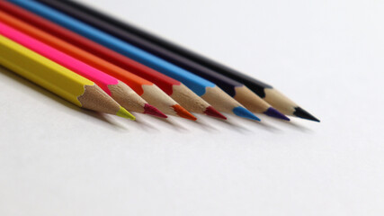 colored pencils on a white background are beautiful