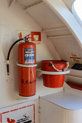 Fire extinguisher and bucket circle on the ship. Caption: �V. Kargin 