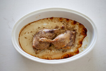 Duck legs confit in the oven plate