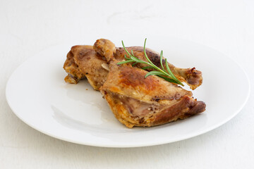 Duck legs confit on the plate