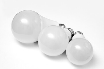 Close-up of three plastic  led bulb on a white background.
