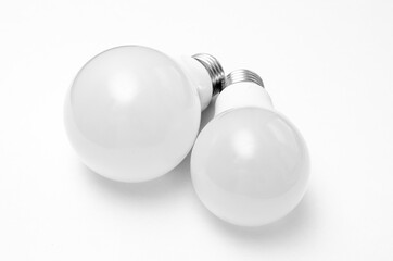 Pair of plastic led bulbs representing the new lighting technology.