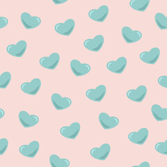 Delicate pattern with turquoise hearts on a pastel pink background. Seamless Valentine's day background with soft green hearts. Cartoon style.