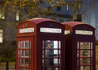 Iconic red British telephone boxes in London