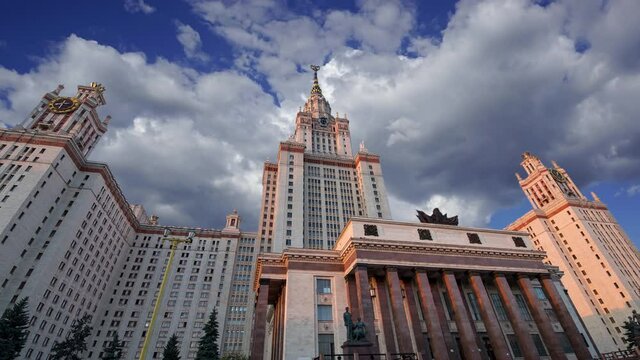 Moscow State University against the moving clouds, main building, Russia