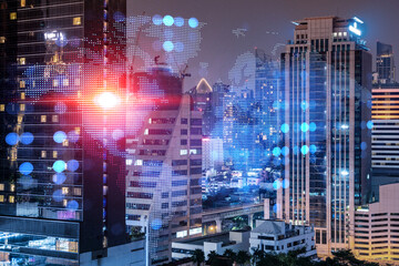 Hologram of Earth planet map on night panoramic cityscape of Bangkok, Asia. The concept of international companies. Multi Exposure.