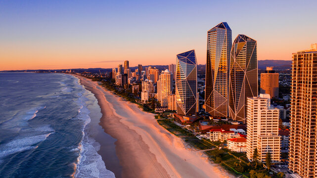 Aerial sunrise view over Surfers Paradise beach and skyline