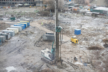 machine for drilling holes in the ground