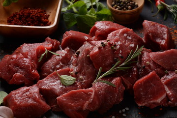 Diced raw beef with ingredients, herbs and spices