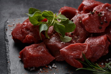 Diced raw beef with ingredients, herbs and spices