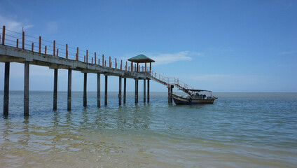 Fototapeta premium Jetty and boat on the sea