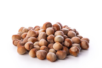 Hazelnuts heap isolated on white background