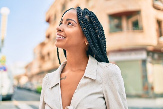 Young African American Woman Smiling Happy Walking At The City.