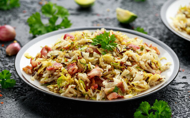 Fried Brussels sprouts with rice and crispy bacon