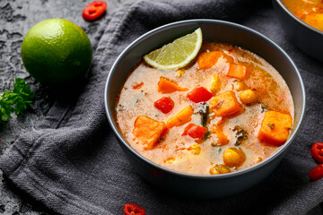 Curry soup with sweet potato, kale, chickpea, red pepper and chicken
