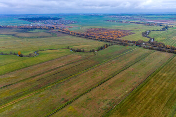 Fototapeta na wymiar Aerial view of agricultural landscape in autumn season