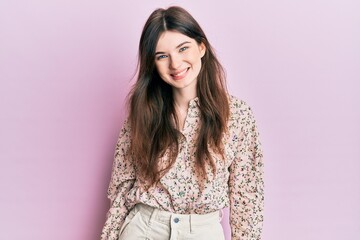 Fototapeta premium Young beautiful caucasian girl wearing elegant clothes looking positive and happy standing and smiling with a confident smile showing teeth