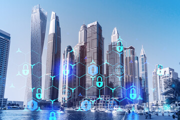 Skyscrapers of Dubai business downtown. International hub of trading and financial services. Lock...